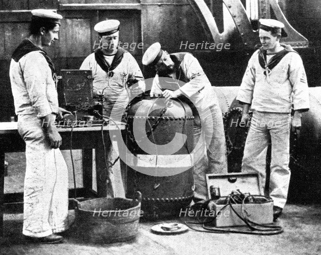 British sailors wiring a mine, First World War, 1914. Artist: Unknown