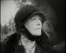 Dame Ellen Terry Standing on a Hill Looking at the View, 1920s. Creator: British Pathe Ltd.