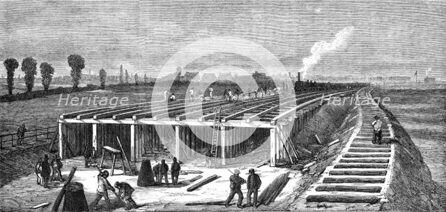 London Main Drainage: Constructing the concrete embankment across the Plaistow Marshes..., 1861. Creator: Unknown.