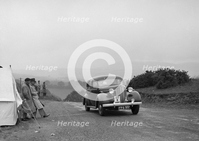 Dodge saloon of AT Morse competing in the South Wales Auto Club Welsh Rally, 1937 Artist: Bill Brunell.