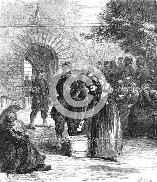 Outside the prison of La Roquette, Paris: letters for the prisoners, 1871. Creator: William Simpson.