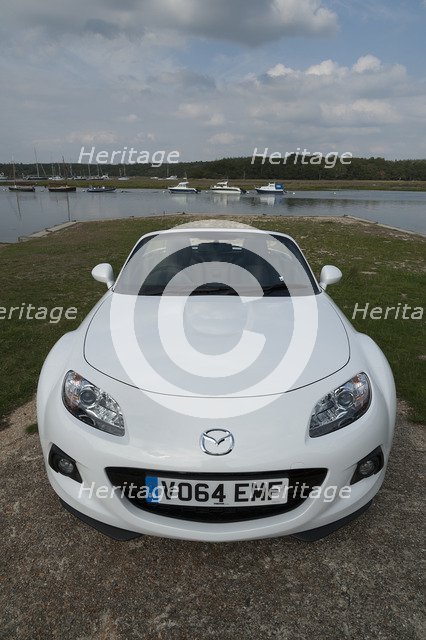 2014 Mazda MX5 Roadster Coupe Artist: Unknown.