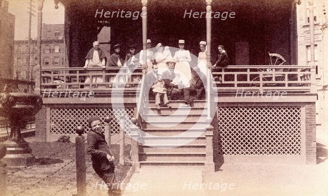 Bellevue Hospital, New York City: children patients, nurses and doctors sitting on a balcony in... Creator: Unknown.