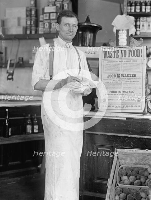 Store Interior - 'Waste No Food', 1917 or 1918. Creator: Harris & Ewing.