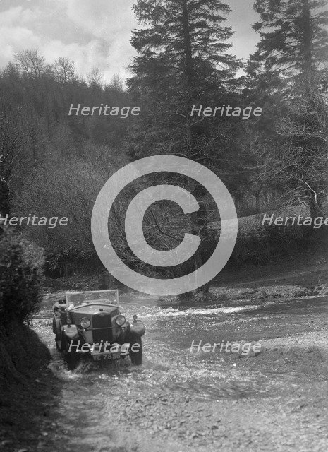 Kitty Brunell road testing a Riley 9 WD tourer, c1930. Artist: Bill Brunell.