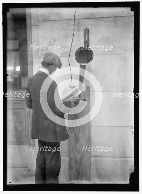 Young man standing near speaker, between 1910 and 1917. Creator: Harris & Ewing.