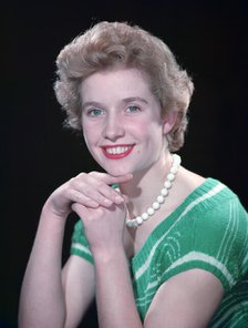 Portrait of a woman with green eyes, c1955.  Creator: Arthur Charles Kirby Ware.