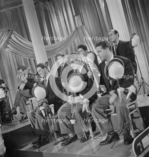 Portrait of Emil Terry, Lou Mucci, Eddie Zandy...Columbia Pictures...Beautiful Doll, N.Y., 1947. Creator: William Paul Gottlieb.