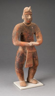 Standing Male Figure Holding a Plate, A.D. 100/400. Creator: Unknown.