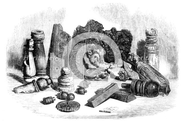 Relics from the Buried City of Brahmunabad, in Sind - Chessmen, Portion of Chess-board..., 1857. Creator: Unknown.