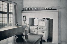 'Kitchen designed by R.W. Symonds', 1938. Artist: Unknown.