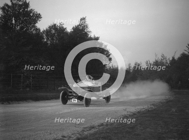 Sports-bodied Morris 2-seater fitted with wheel discs. Artist: Bill Brunell.