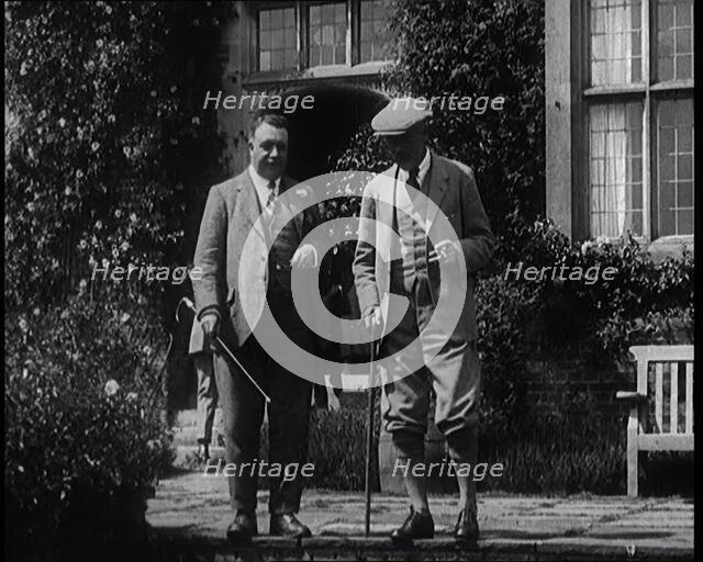 British Prime Minister Ramsay MacDonald Exits the Door of Chequers Holding a Stick..., 1924. Creator: British Pathe Ltd.