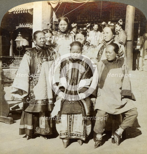 A group of women in the courtyard of a wealthy Chinese house, Peking, China, 1902. Artist: Underwood & Underwood