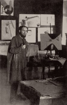 El Lissitzky in his studio in Vitebsk, 1919. Creator: Anonymous.