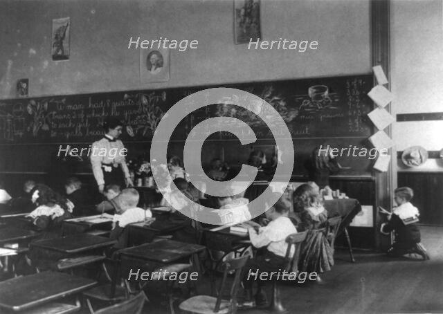 Children in school in Washington, D.C. - studying mathematics, (1899?). Creator: Frances Benjamin Johnston.