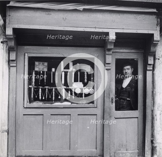 A Muslim merchant, Bosnia-Hercegovina, Yugoslavia, 1939. Artist: Unknown