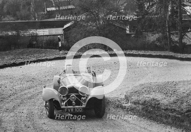 Jaguar SS 100 of CJ Gibson competing in the RAC Rally, 1939. Artist: Bill Brunell.