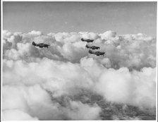 RAF Film Production Unit film still showing a 'hurribomber' in flight, 1942. Creator: Royal Air Force Fim Production Unit.