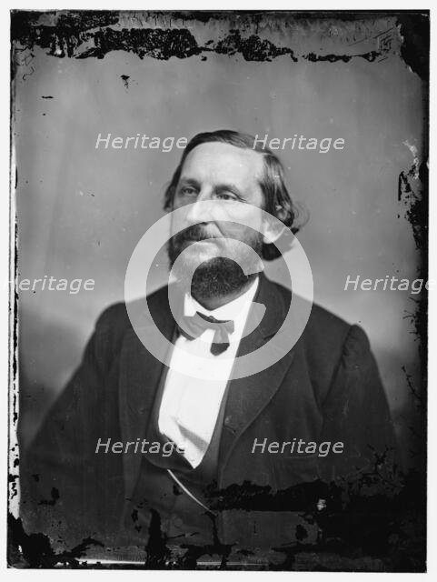 Unidentified man, half-length portrait, facing left, between 1860 and 1875. Creator: Unknown.