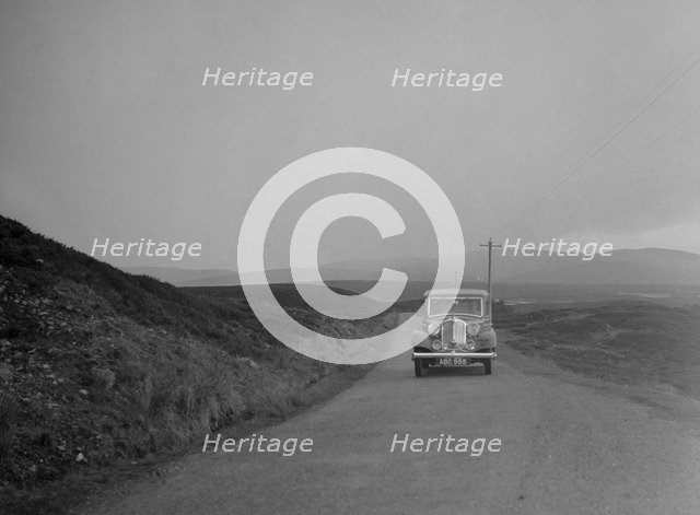 Rover of SJ Clutterbuck competing in the RSAC Scottish Rally, 1936. Artist: Bill Brunell.