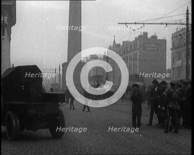 Crowds Parting and Being Held Back by Soldiers for Armoured Cars to Pass Through the Streets...,1920 Creator: British Pathe Ltd.