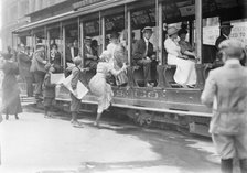 Entering street car ?, between c1910 and c1915. Creator: Bain News Service.