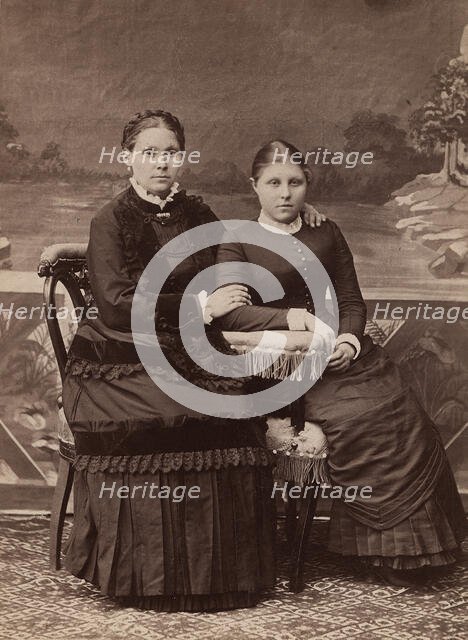 Paired photo portrait of Mamomnovs Mamakra Avdeevna and daughter Ekaterina Yakovlevna, 1890. Creator: Unknown.