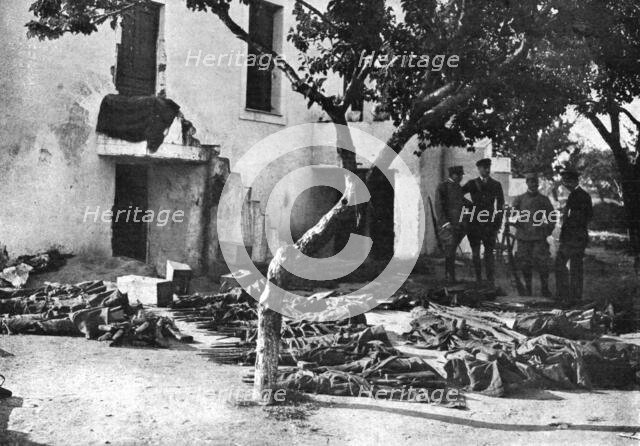 'Les Evenements de Grece; Les intrigues des royalistes: un lot de fusils enveloppes de..., 1917. Creator: Unknown.