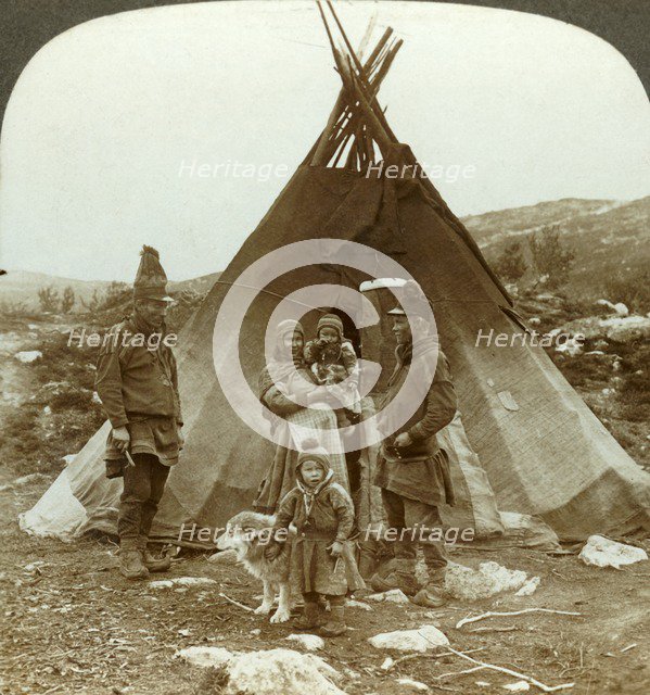 'Laplander family and sledge dog - outside their summer home - on a hillside in Norway', c1905. Creator: Unknown.