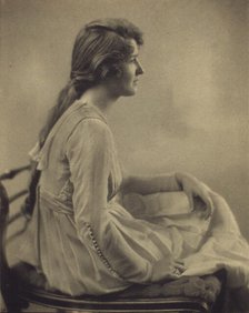 Young woman seated, looking right, 1918. Creator: Unknown.