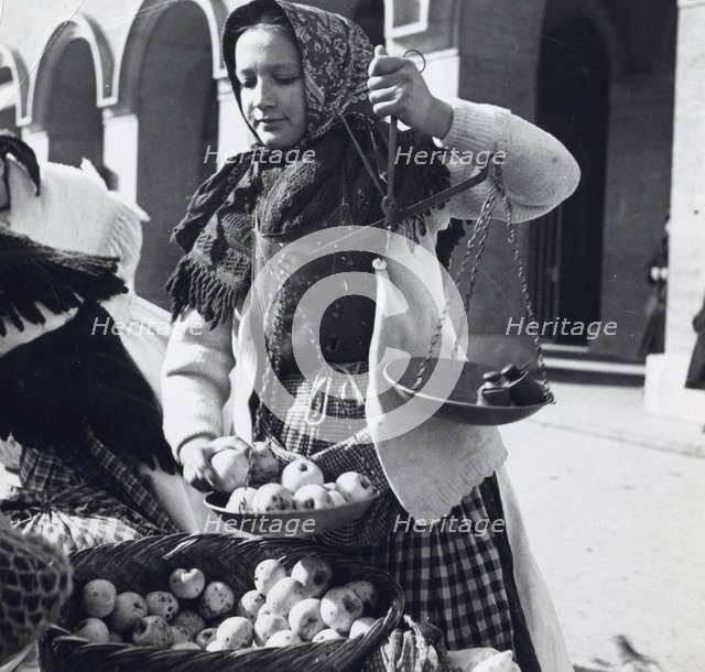 A girl selling apples, Zagreb, Croatia, Yugoslavia, 1939. Artist: Unknown