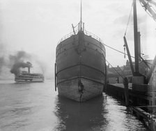 Unidentified freighter, Detroit, Michigan, with passenger steamer Britannia..., c1906-1915. Creator: Unknown.