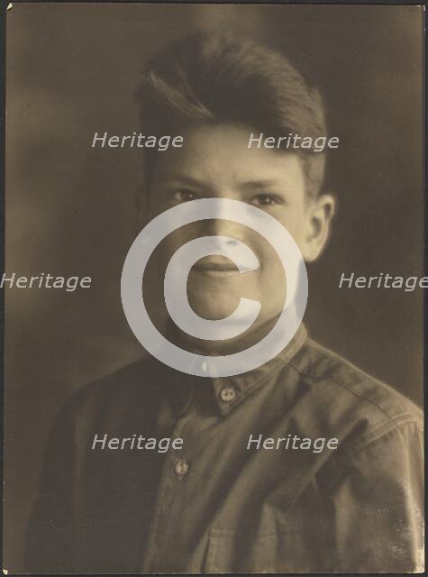 Portrait of a Young Boy in Button Up Shirt, 1907-1943. Creator: Louis Fleckenstein.