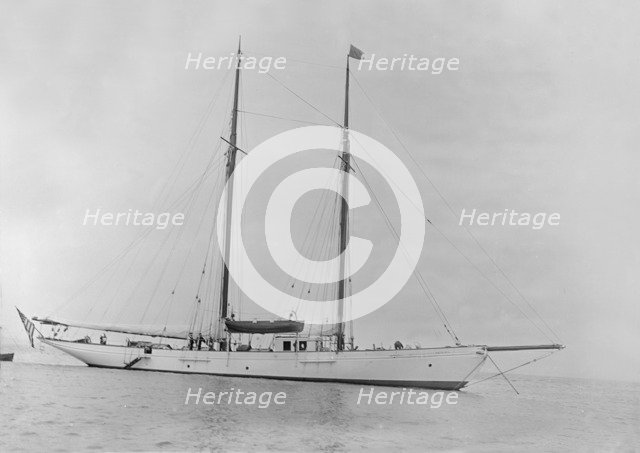 The schooner 'Dwyn-Wen' at anchor, 1920. Creator: Kirk & Sons of Cowes.