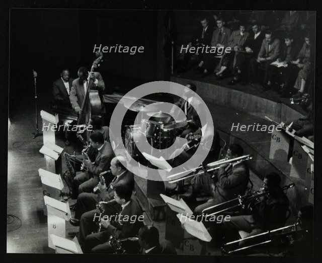 The Count Basie Orchestra in concert at Colston Hall, Bristol, 1957. Artist: Denis Williams