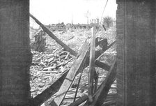 'Vue prise d'une fenetre de la "Maisonnette"sur des batiments en ruines, ou les Allemands...', 1916. Creator: Unknown.