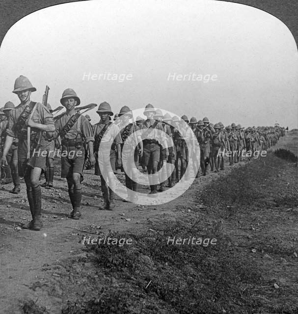 British soldiers marching through the desert to Baghdad, World War I, 1914-1918.Artist: Realistic Travels Publishers