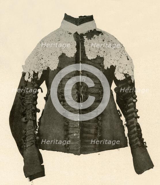 'Doublet of black cloth trimmed with silk braid and crochet buttons', c17th century, (1937). Creator: Unknown.