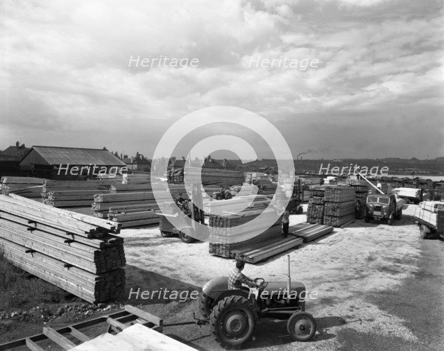 A busy timber yard, Bolton upon Dearne, South Yorkshire, 1960.  Artist: Michael Walters