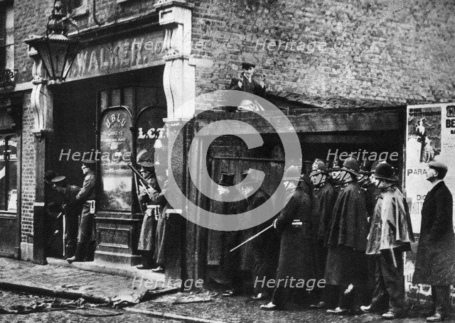 The Sidney Street siege, Whitechapel, London, 1911, (1935). Artist: Unknown