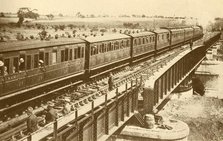 'A Train Passing Over The Bridge', c1930. Creator: Unknown.