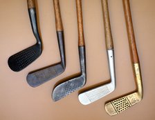 Early iron golf clubs. Artist: Unknown