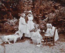 Girls learning infant care, Birley House Open Air School, Forest Hill, London, 1908. Artist: Unknown.