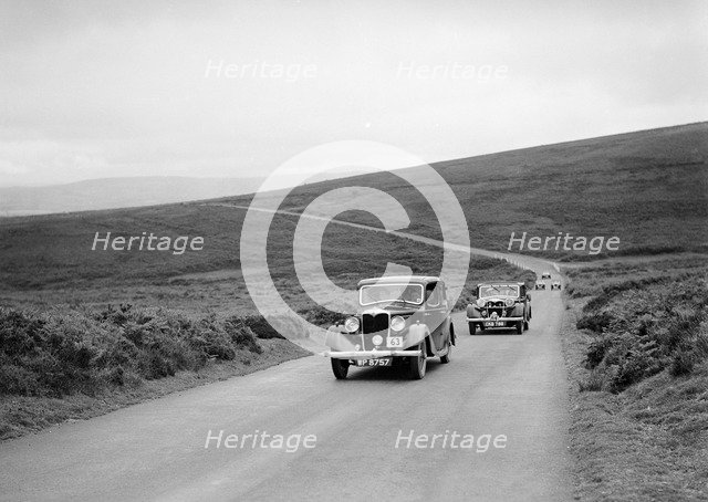 LA Forty's Riley Falcon ahead of J Boardman's Riley Kestrel at the MCC Torquay Rally, July 1937. Artist: Bill Brunell.