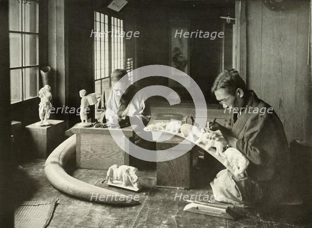 'The Ivory Carvers', 1910. Creator: Herbert Ponting.
