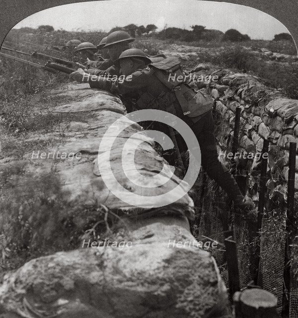 Canadians leaving their trenches to rush a German position, World War I, 1914-1918.Artist: Realistic Travels Publishers