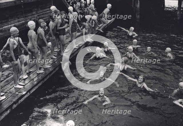 Girls' swimming class, Sweden, 1939. Artist: Otto Ohm