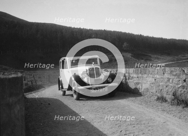 Austin Ten-Four 2-door saloon of JA Flewitt competing in the RSAC Scottish Rally, 1933. Artist: Bill Brunell.
