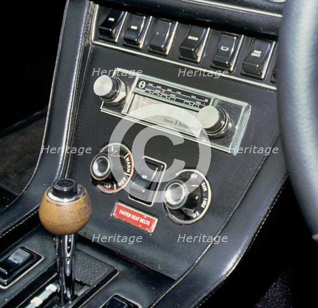 1974 Jensen Interceptor dashboard showing 8 track cartridge sound system. Creator: Unknown.